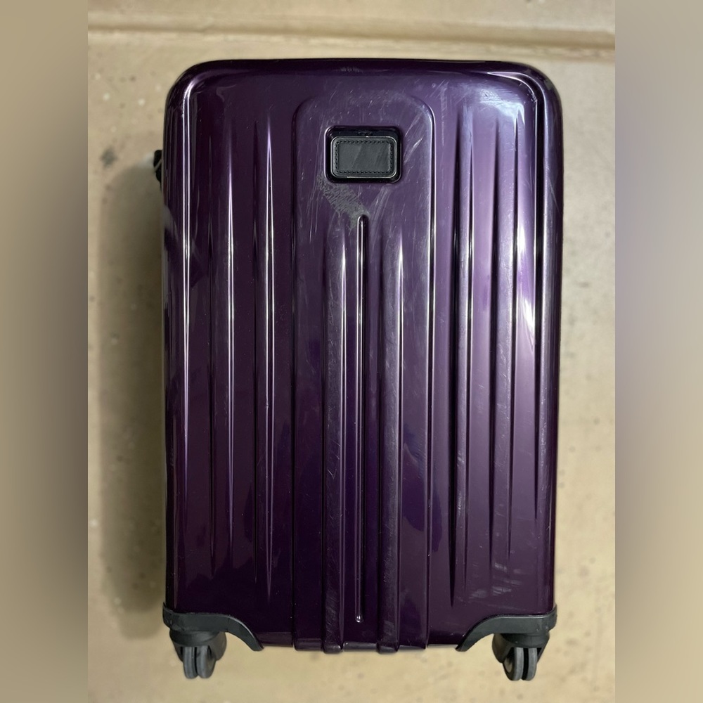 Used Tumi V4 International 22-inch Expandable Spinner Carry On Purple 22x14x9